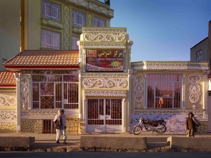 A building in the city of Herat is decked with some of the weddingcake 