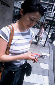 101891-woman-mobile_phone[1].jpg