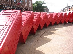 phoneboxes-phone-box-red-stacked-domino-in-London-Kingston-England-RF[1].jpg